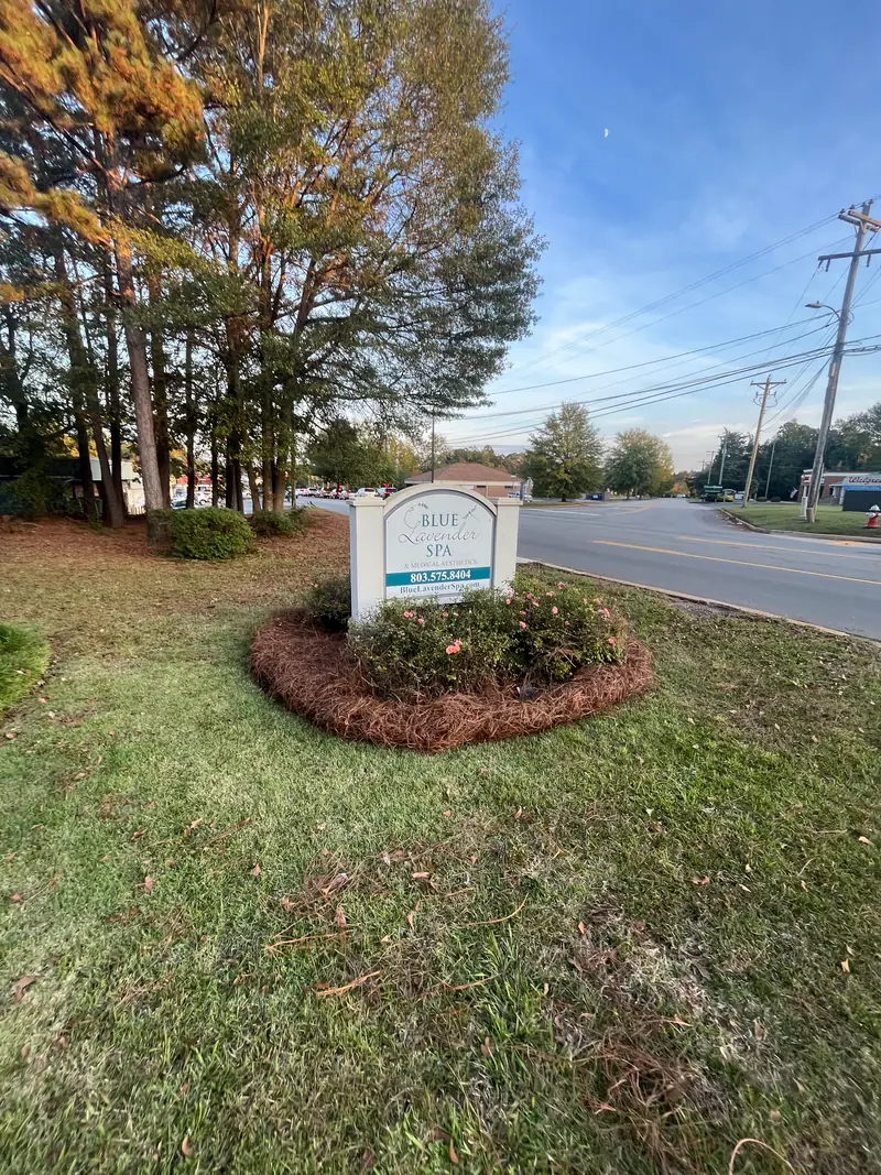 Landscaped bed around a commercial monument sign